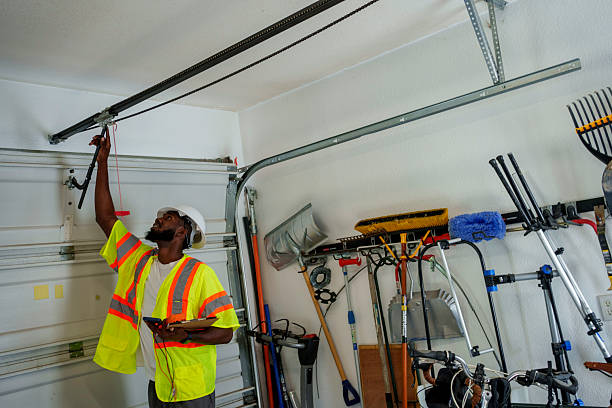 Professional Garage Door Roller Replacement technician working in Hopelawn, NJ